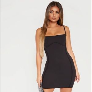 Black strappy binding bust detail bodycon dress from pretty little things